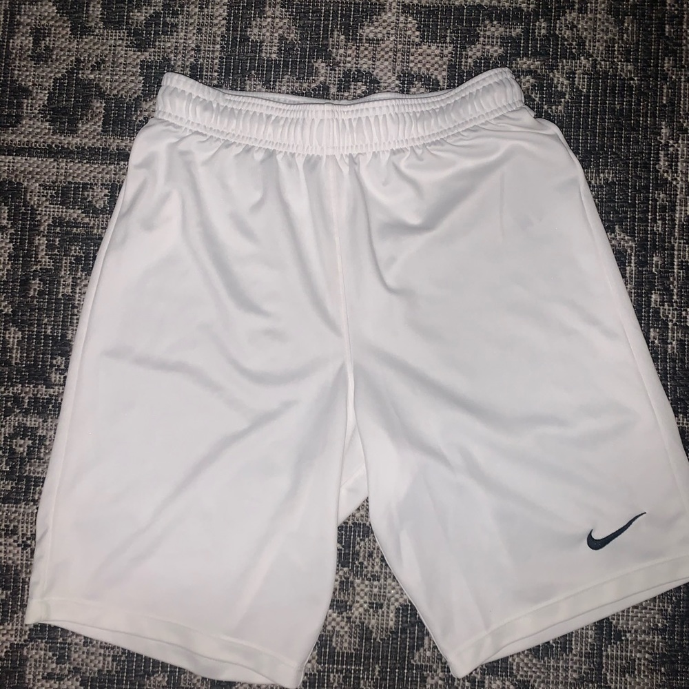 White Nike shorts